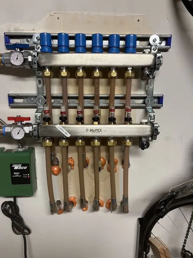 Plumber performing Gas Line Installation at a residential property in Summit